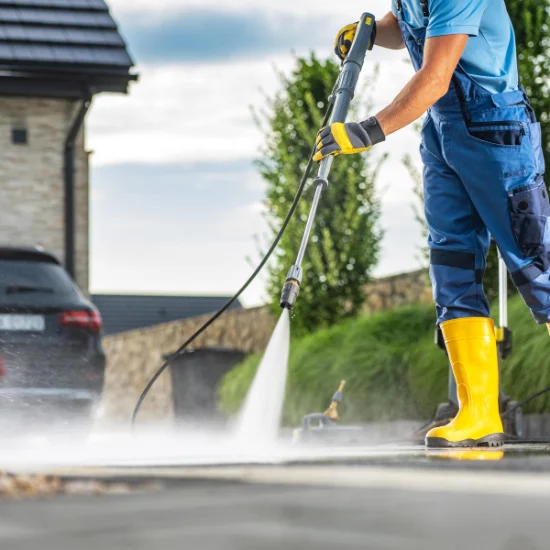 Melbourne pressure washing job being done on a house's driveway.