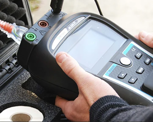 Man using equipment for testing and tagging.