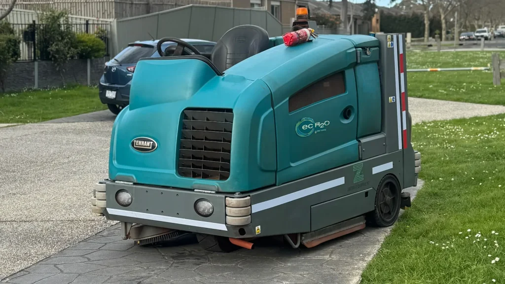 Zintra Group ride-on floor scrubber cleaning a commercial site in Melbourne