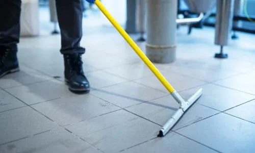 close-up-mop-cleaning-industrial-plant-floor_342744-1210